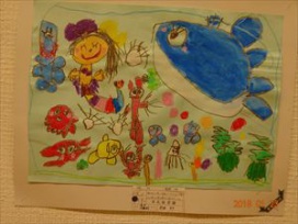 牟礼保育園　年少組　内田　キラさんの作品「海の中で人魚に変身して、クジラさんや魚さんといろんな色の積み木で遊びたいな。」
